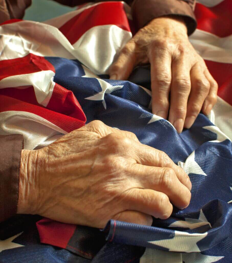 A Woman Holding USA Flag - ViaQuest Hospice